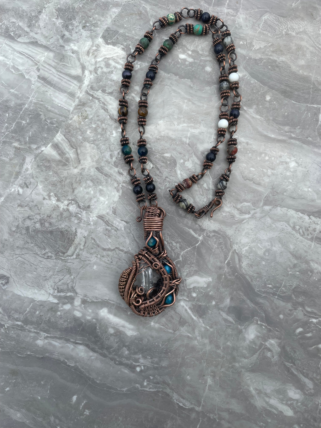 Clear Quartz with blue tiger eyes