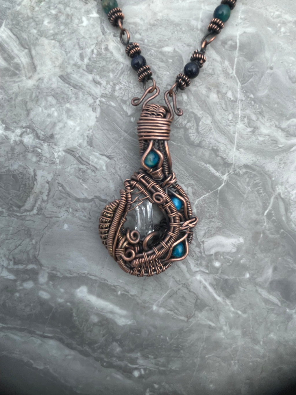 Clear Quartz with blue tiger eyes