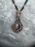 Clear Quartz with blue tiger eyes